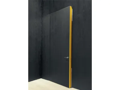 Porta filomuro con anta in legno carbone e stipite laccato ocra Integra di Albed