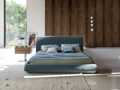 Letto in tessuto imbottito con testiera e box contenitore Bloom di Bonaldo