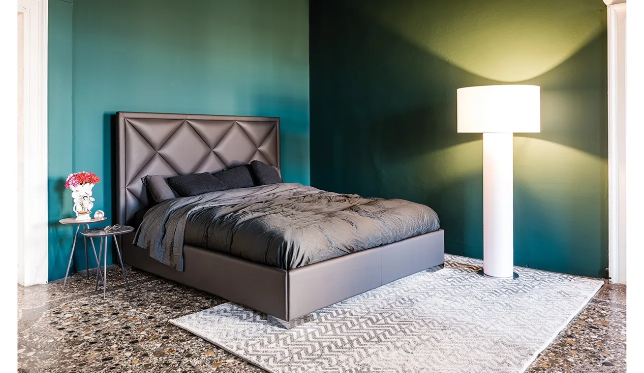 Letto contenitore in ecopelle con testiera lavorata a rombi Patrick di Cattelan Italia
