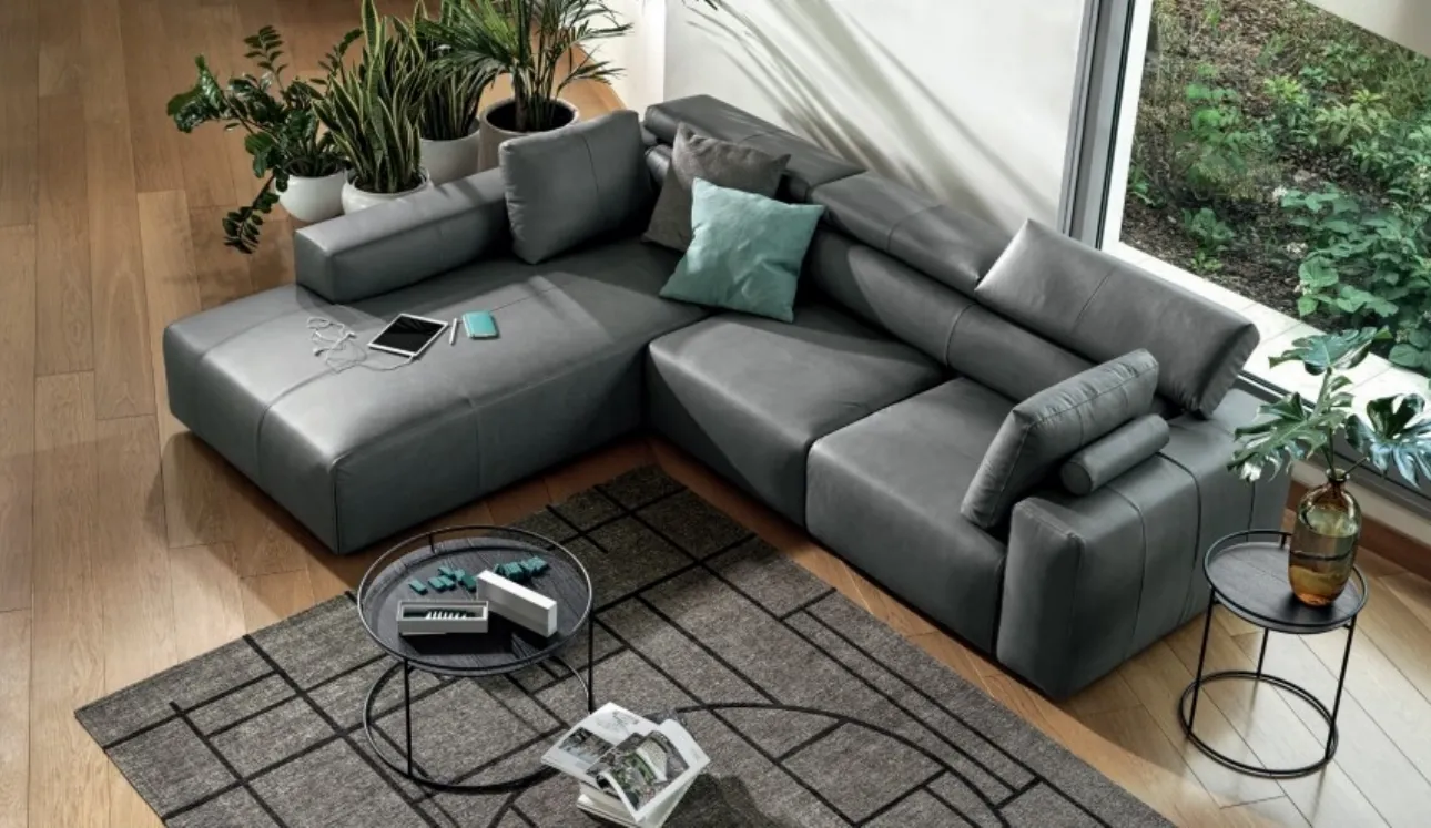 Divano relax in pelle con penisola Dado di Calligaris